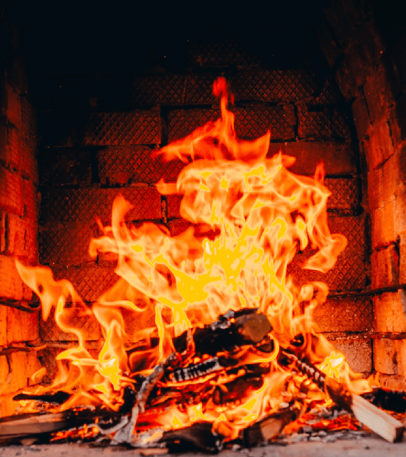 texture background of fire flame with coals in furnace